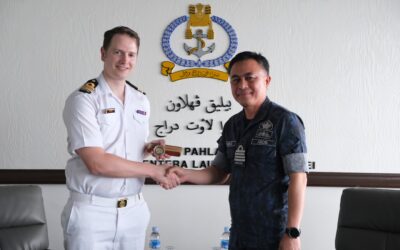 FAREWELL COURTESY CALL BY LIEUTENANT COMMANDER HARRY EDWARD BALL, BRITISH LOAN SERVICE DENTAL OFFICER